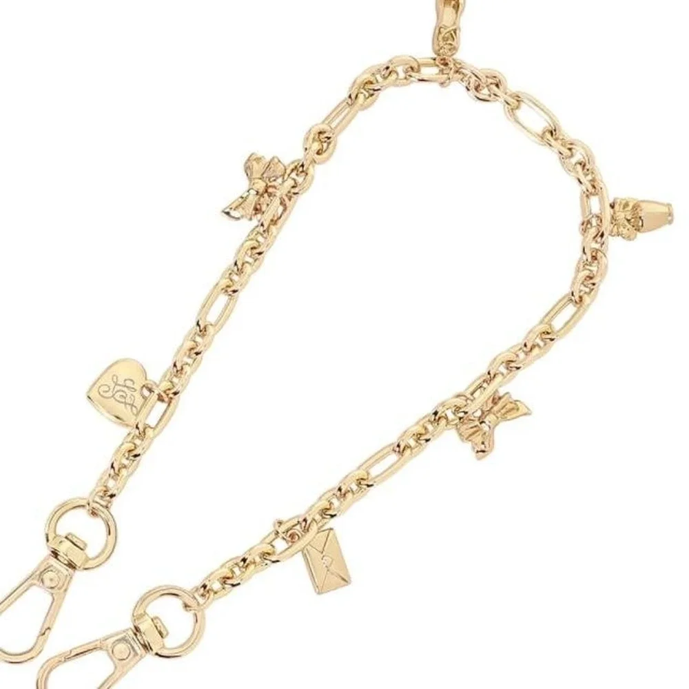 Loveshackfancy x case mate gold phone charm with heart and bow charms